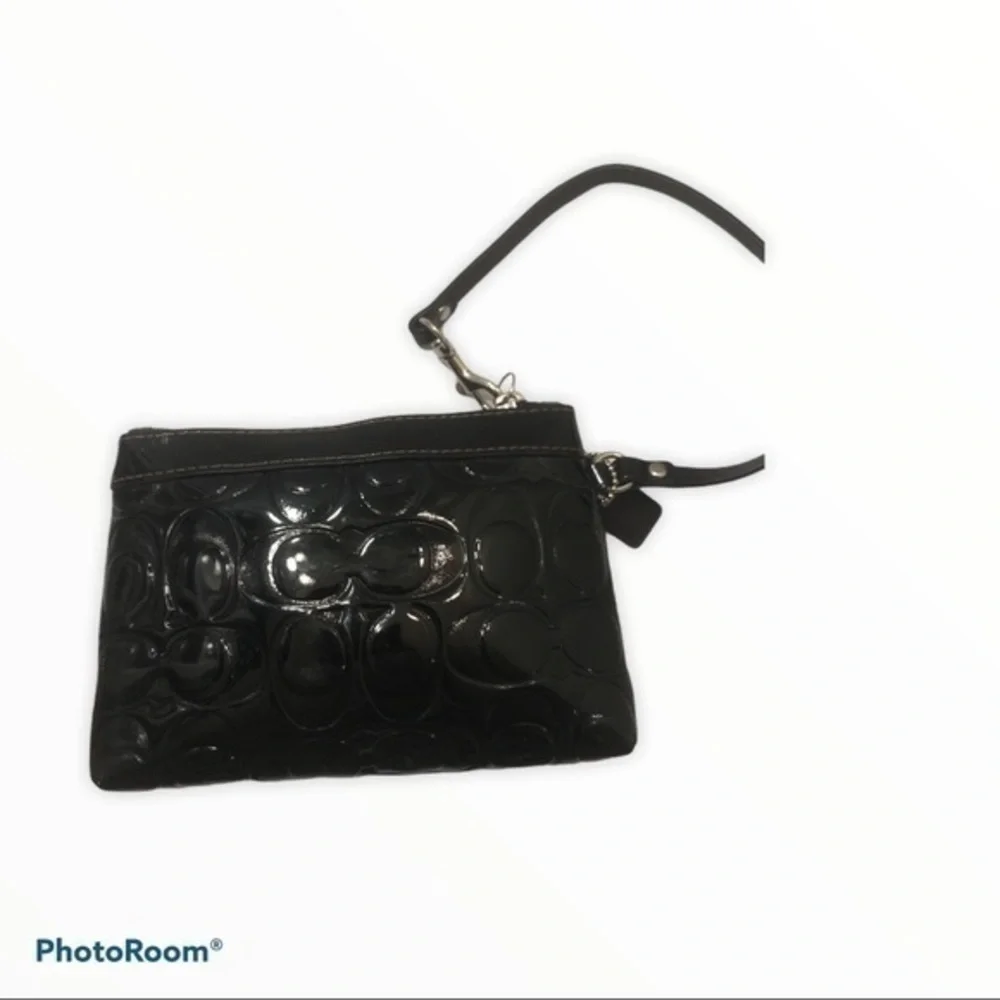 Coach embossed black leather wristlet clutch bag